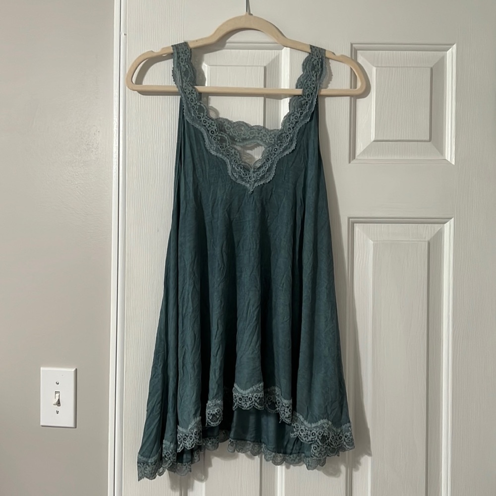 Blue tank top.